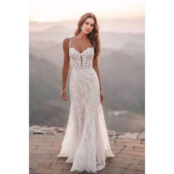 Allure Bridal 1218 | Chantilly lace and translucent tulle provides beautiful contrast to the sequined and tonal beaded appliques used throughout this bridal sheath gown.