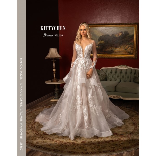 Kitty Chen Bridal Bianca H2226 | Deep V neck gown with sheer Long sleeves with Lace detail | Full multi tiered skirt | Wedding Dress