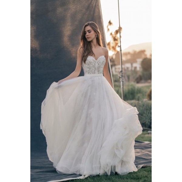 Allure Couture Style C726 | Organza overskirt of this strapless sweetheart ballgown barely hints at the continuation of the richly sequined lace featured along the bodice.