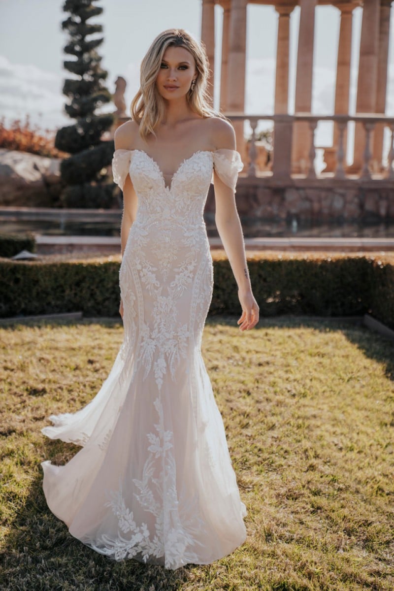 Allure Bridal 1163 | Curve-hugging sequined appliques, along with symmetrical pearled beadwork
