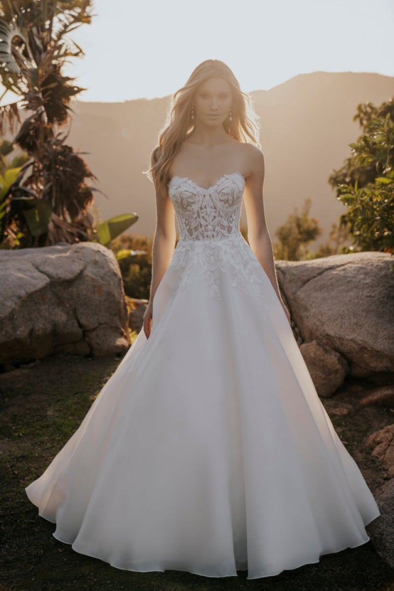 Allure Bridal 1164 | Brilliantly sparkling sequined appliques compose the strapless bodice of this traditional organdy ballgown.