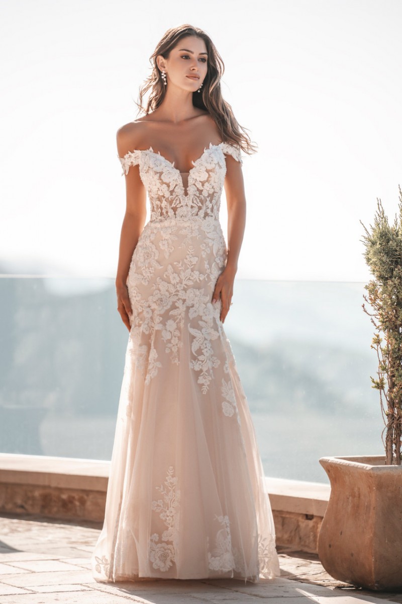 Allure Bridal 1202 | The soft sheen of pearl beading pairs beautifully with the floral lace and sparkling tulle of this romantic, off-shoulder gown.