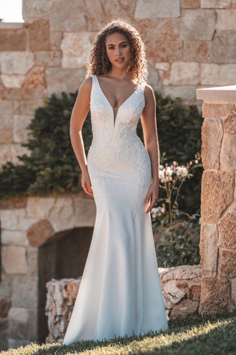 Allure Bridal 1201 | Tonal beading, along with sequins and pearled appliques, adorn the soft, flexible crepe of this sleeveless, V-neck sheath wedding dress.
