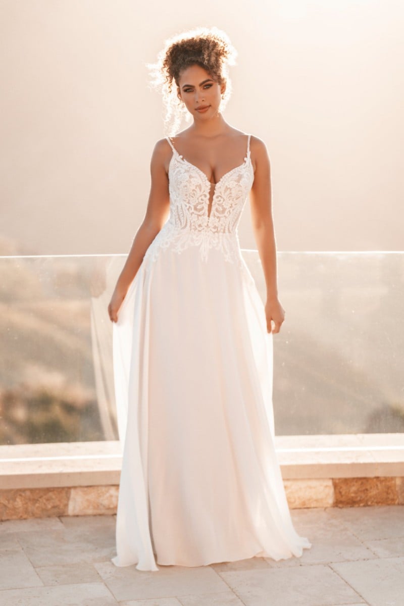 Allure Bridal 1209 | Fluid chiffon composes the A-line skirt of this strappy wedding dress, which features sequined lace over Chantilly lace across the bodice and illusion train.