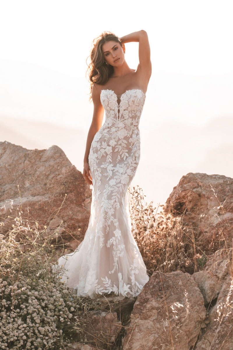 Allure Bridal 1212 | Beaded lace appliques and delicate tulle compose this strapless sheath gown, with matching detachable illusion sleeves.