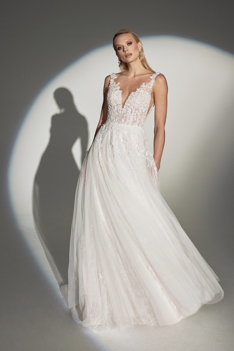 Justin Alexander Gussie 99245 | Plunging illusion Sabrina neckline paired with a low V-back for a modern and sexy twist